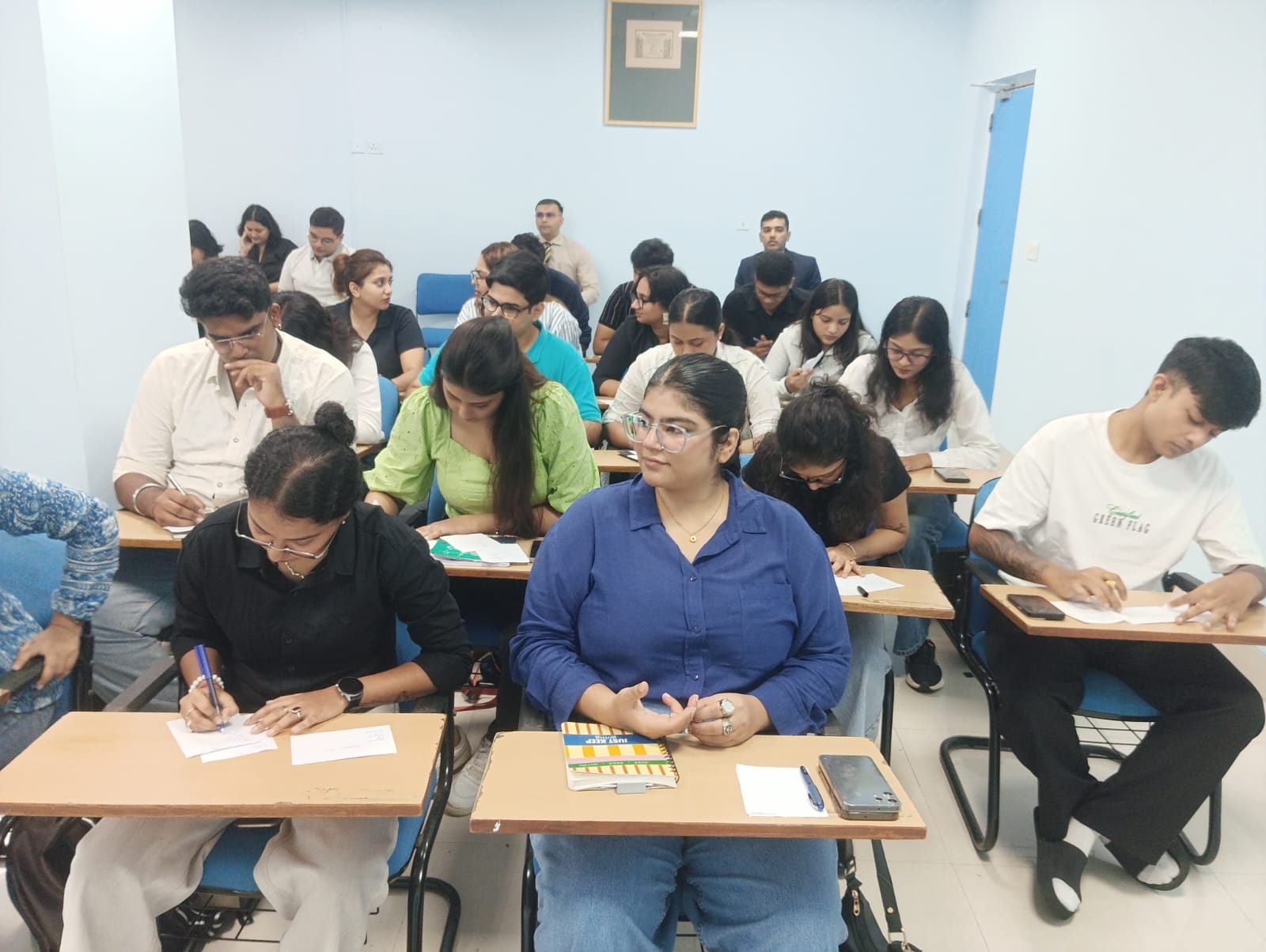 Participants working through a practical exercise during an HTI classroom session