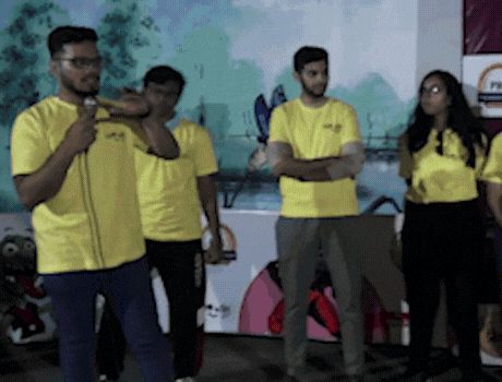 Participants presenting to their peers during a Lead by HTI presentation skills workshop