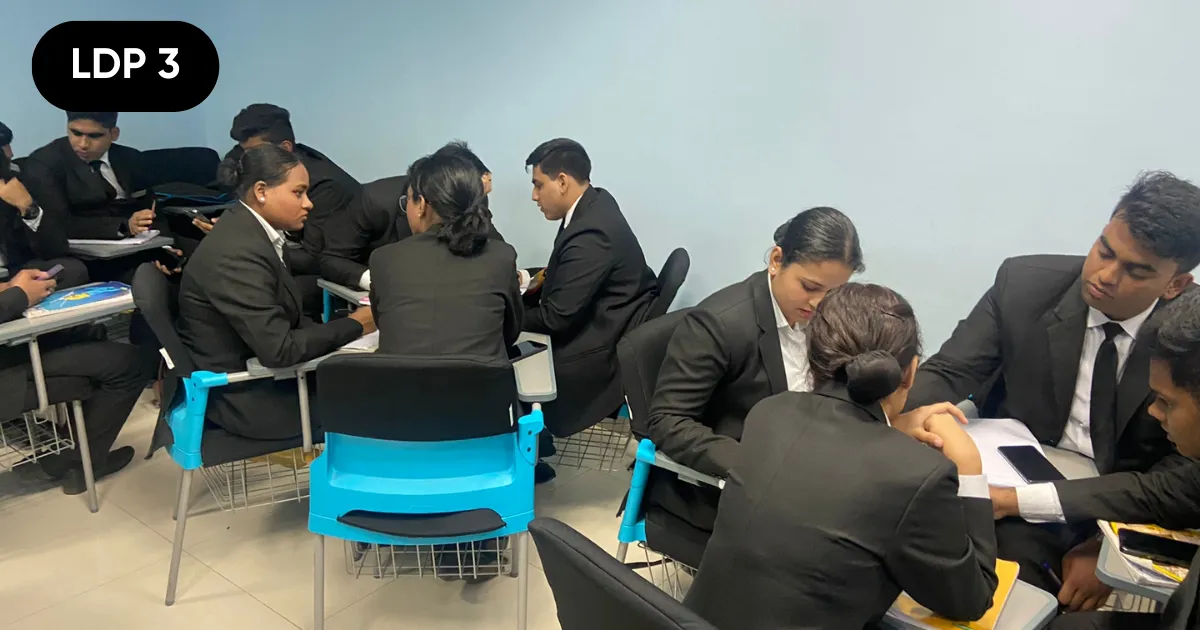 Participants working through a group exercise in HTI's Framework of Management session